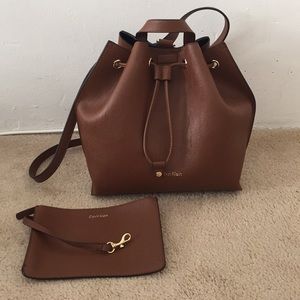 NWOT Calvin Klein leather backpack and wristlet